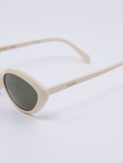 Avrundet cateye solbrille i kremhvit