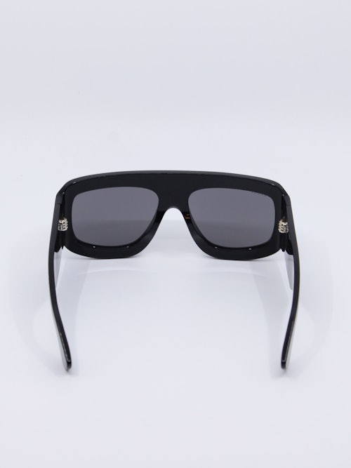 Svart, oversized solbrille dekket med Gucci-logo