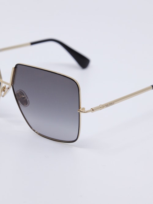 Metallsolbrille i gull med lilla brilleglass, oversized passform