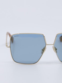 Oversized metallsolbrille i gullmed blå brilleglass