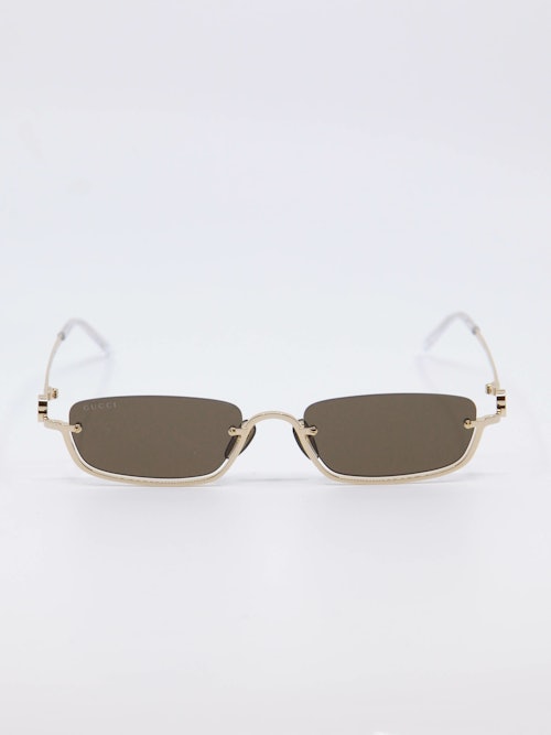 Smal metallsolbrille med gulldetaljer