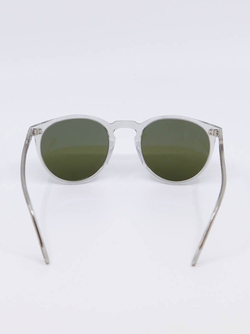 Rund solbrille med transparent ramme og grønne glass