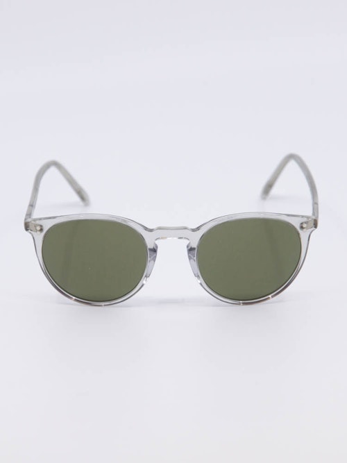 Rund solbrille med transparent ramme og grønne glass
