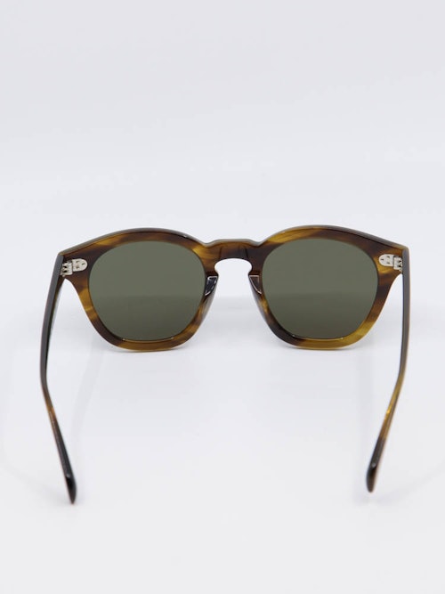 Rund solbrille fra Oliver Peoples