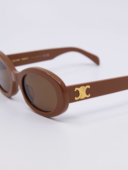 Oval solbrille i brun