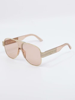 Bilde av solbrille fra Dior i duse rosatoner