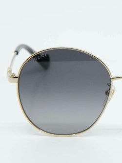 Rund metallsolbrille med graderte glass i farge grå