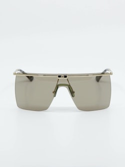 Bilde av solbrille fra Gucci i gulltoner