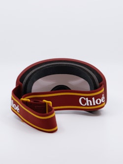 Goggles i rød og gul, bilde bakfra