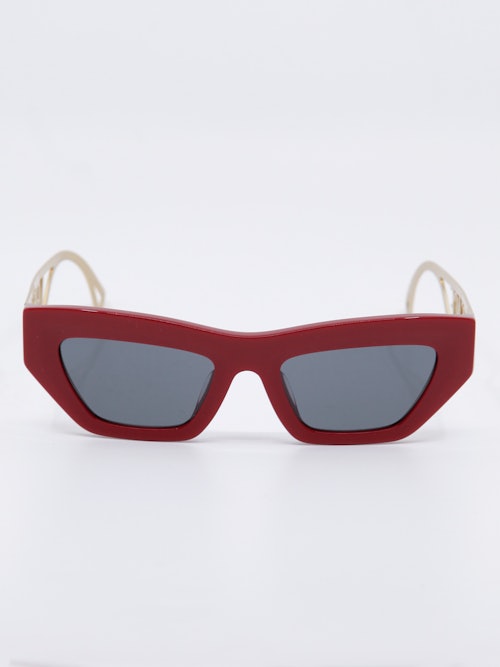 Rød solbrille med grå glass, bilde