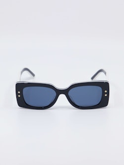Mørkblå Dior Pacific solbrille med blå brilleglass og hvite stjerner på brillesiden