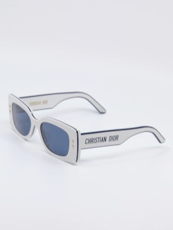 Hvit og blå Pacific Dior solbrille med stjernedetaljer, bilde fra siden