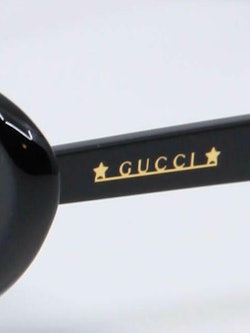 Svart cat-eye solbrille med runde kanter fra Gucci, nærbilde